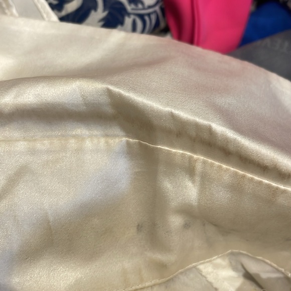 Beautiful silk blouse with black lace trim along the waist area. - Picture 10 of 10